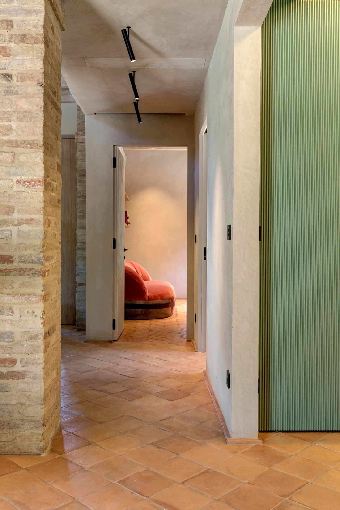 The corridor past the laundry