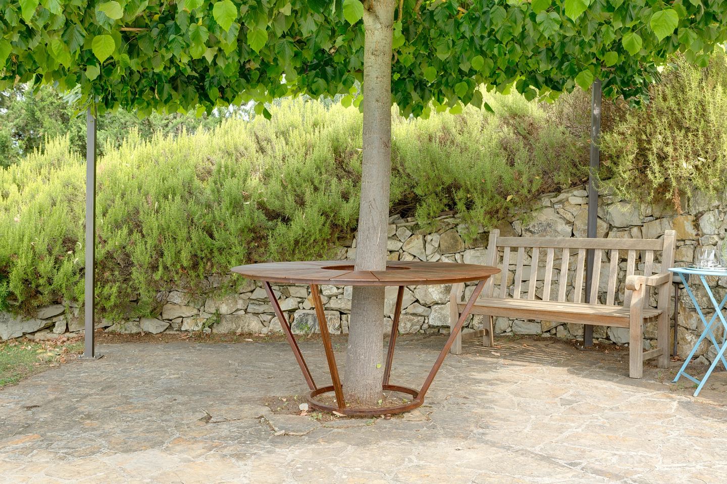 The table with the bench along the wall