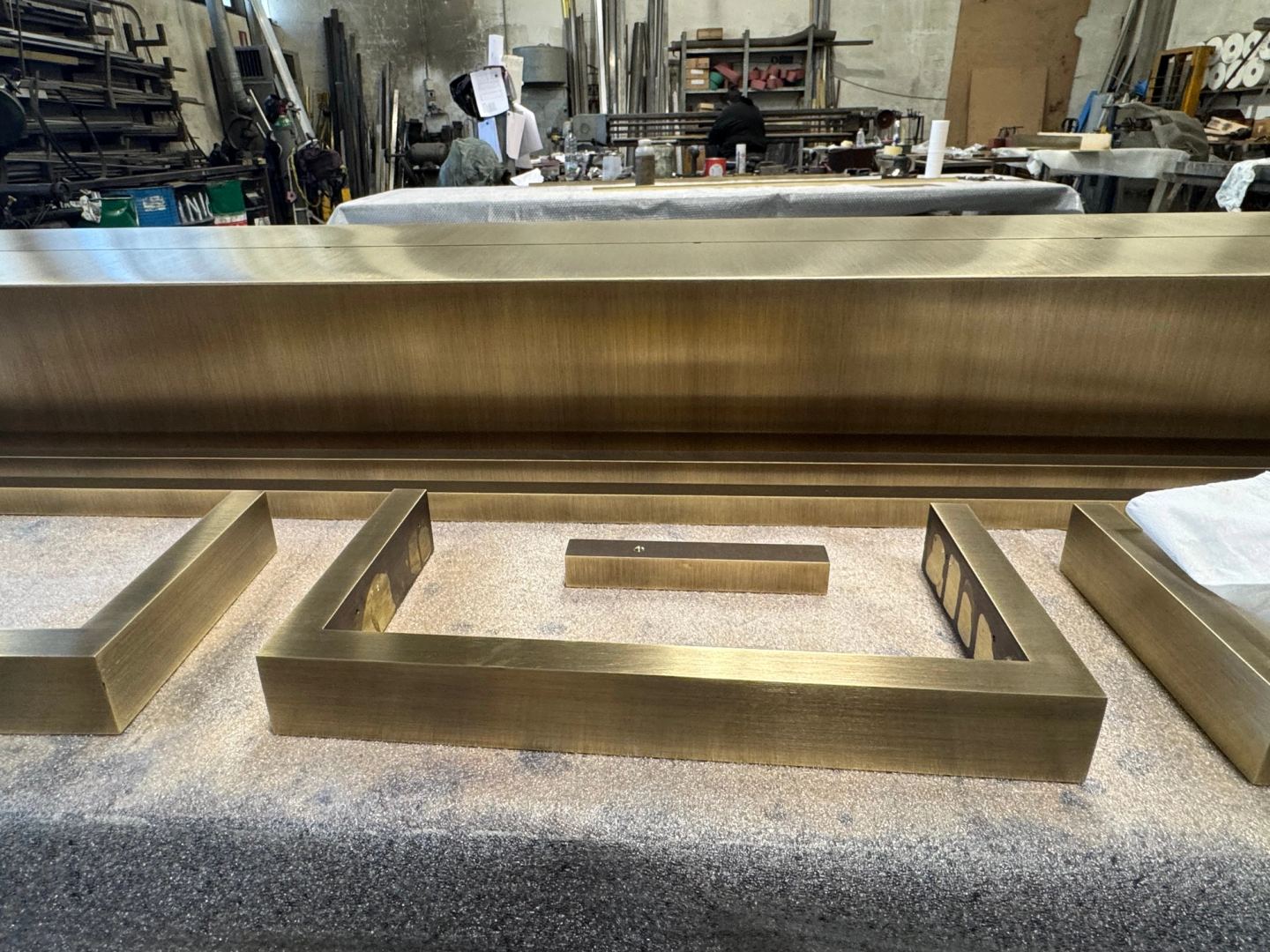Bronze trims waiting on the bench