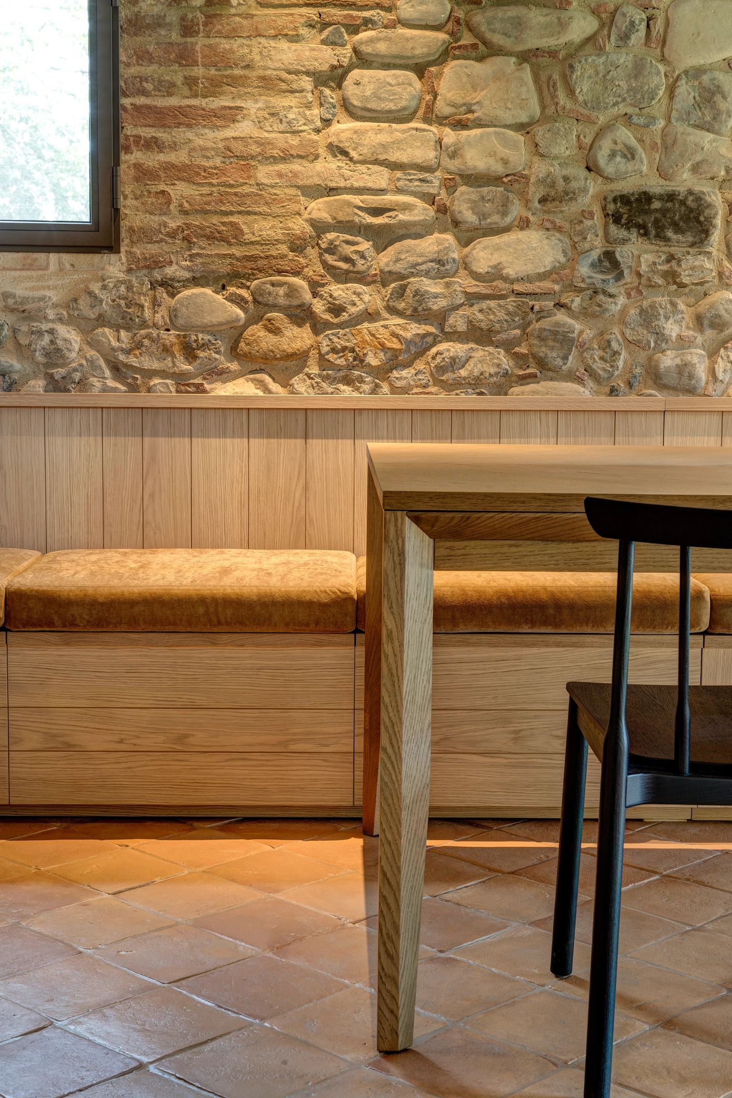 The bench pulled out from the table