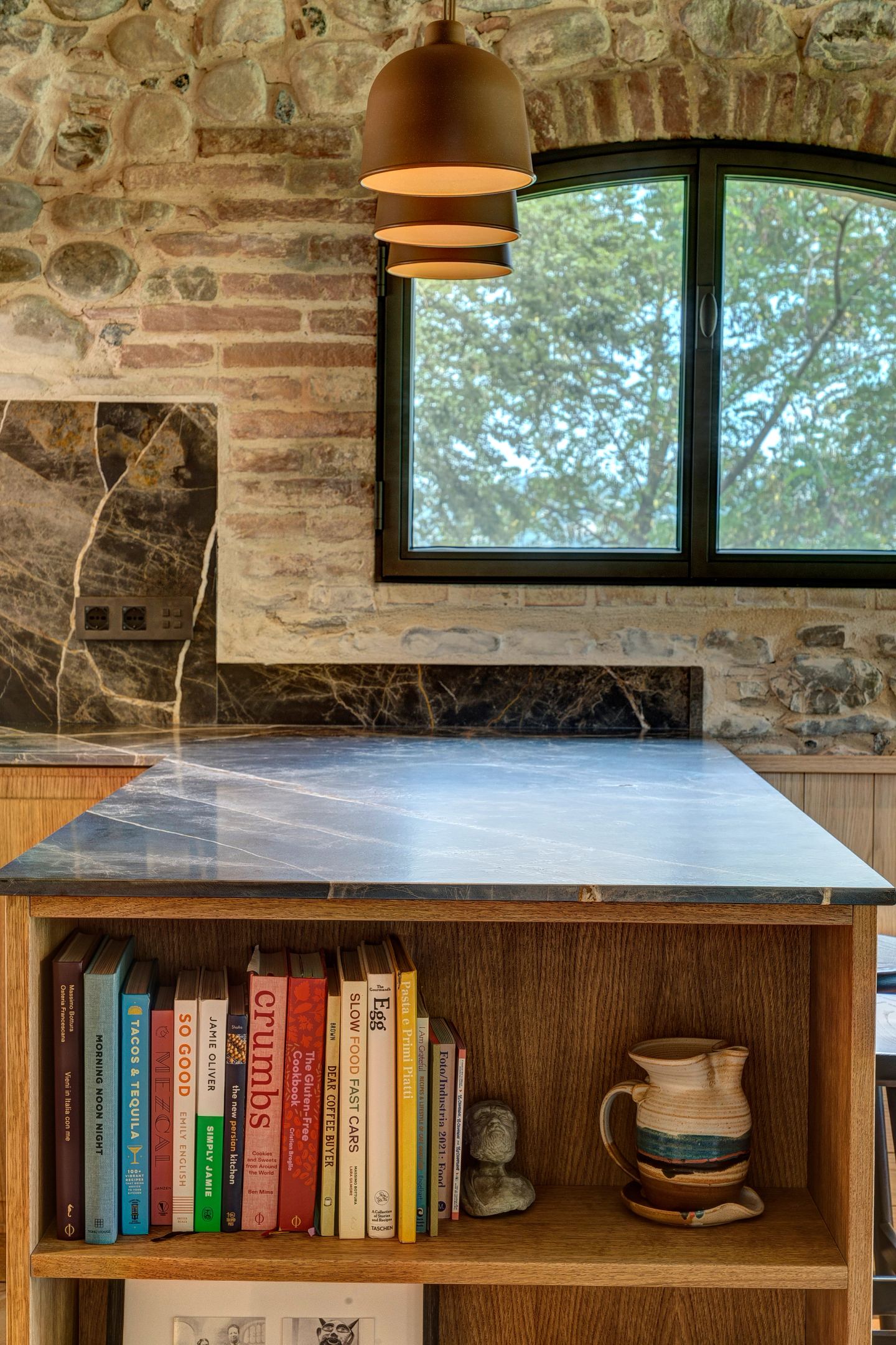 Cookbooks shelved into the island