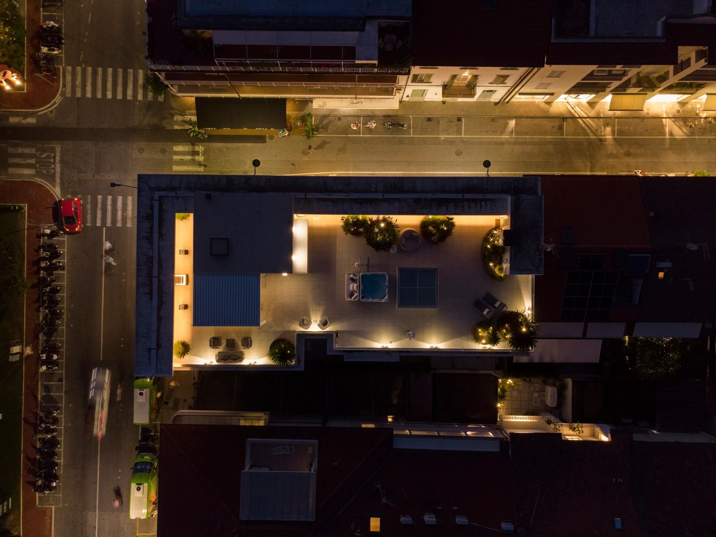 The roof and the street below at night