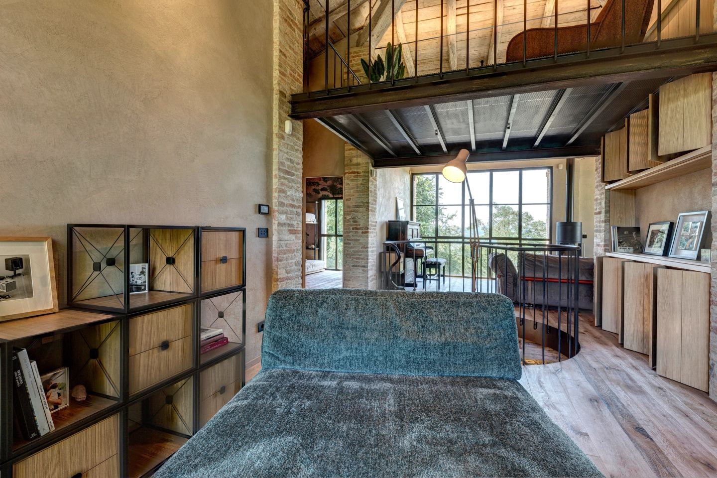 The daybed drawn up against the cubes