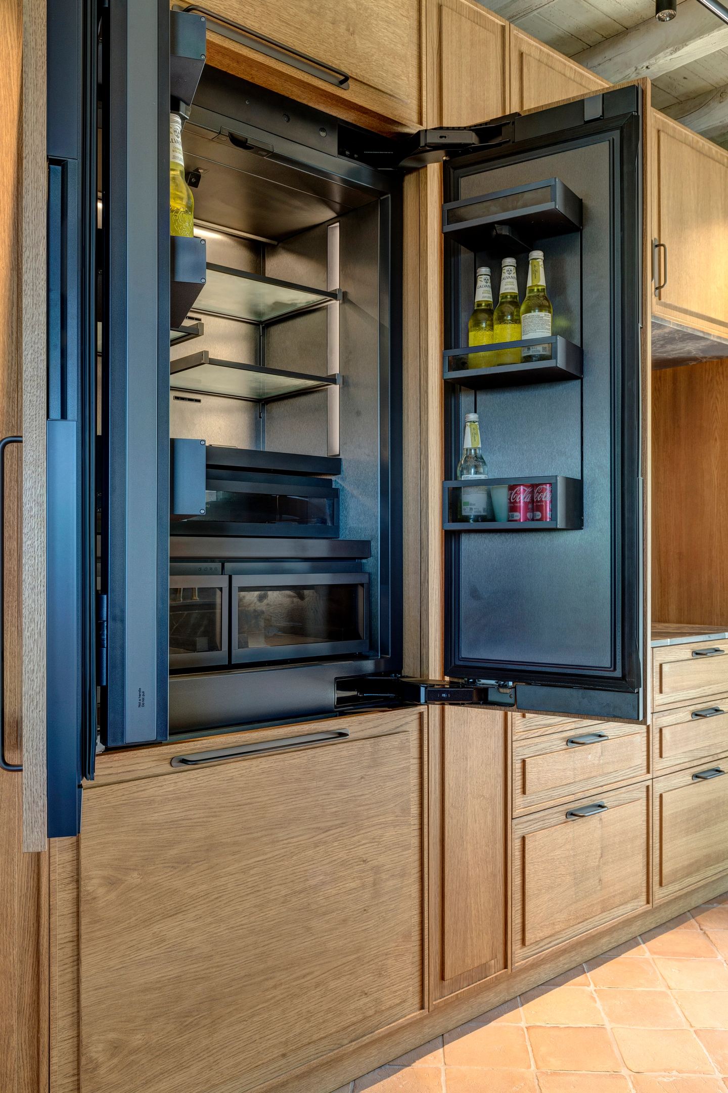 The refrigerator column standing open
