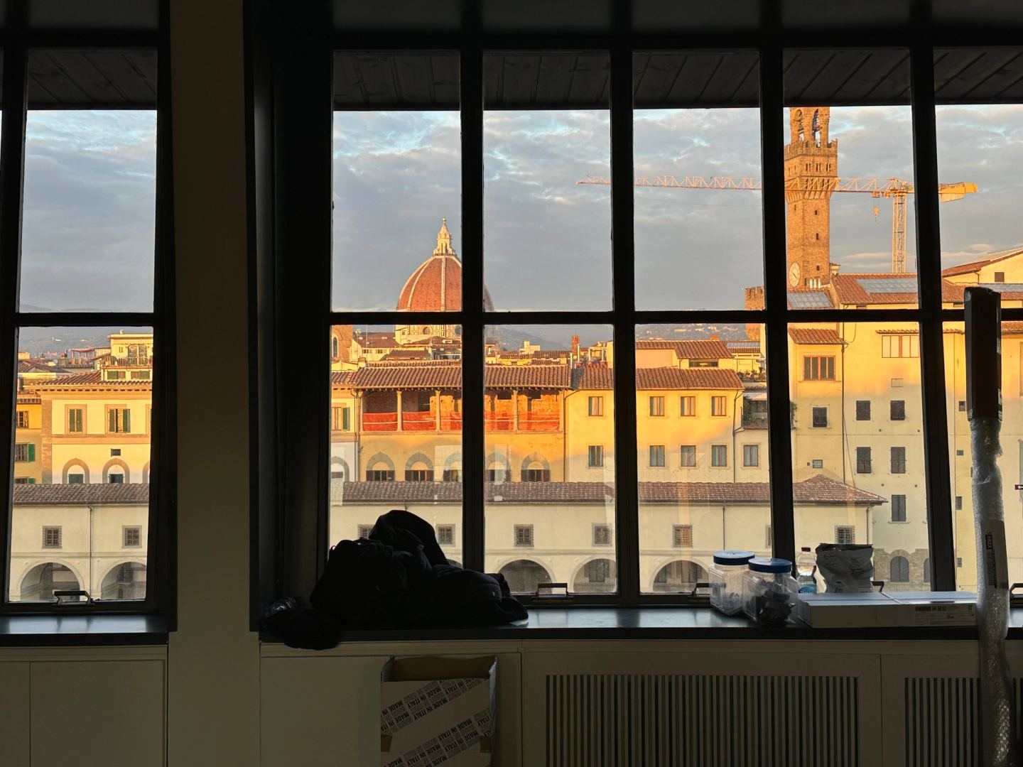 The Duomo and Palazzo Vecchio framed at sunset