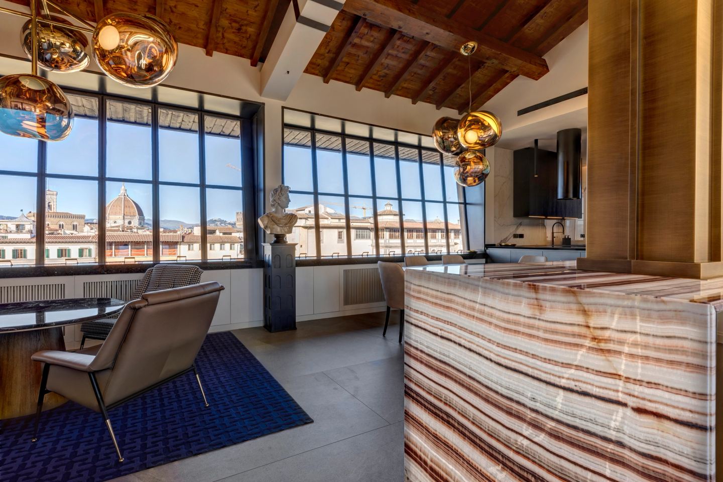 Fireplace, onyx counter and the window wall in one view