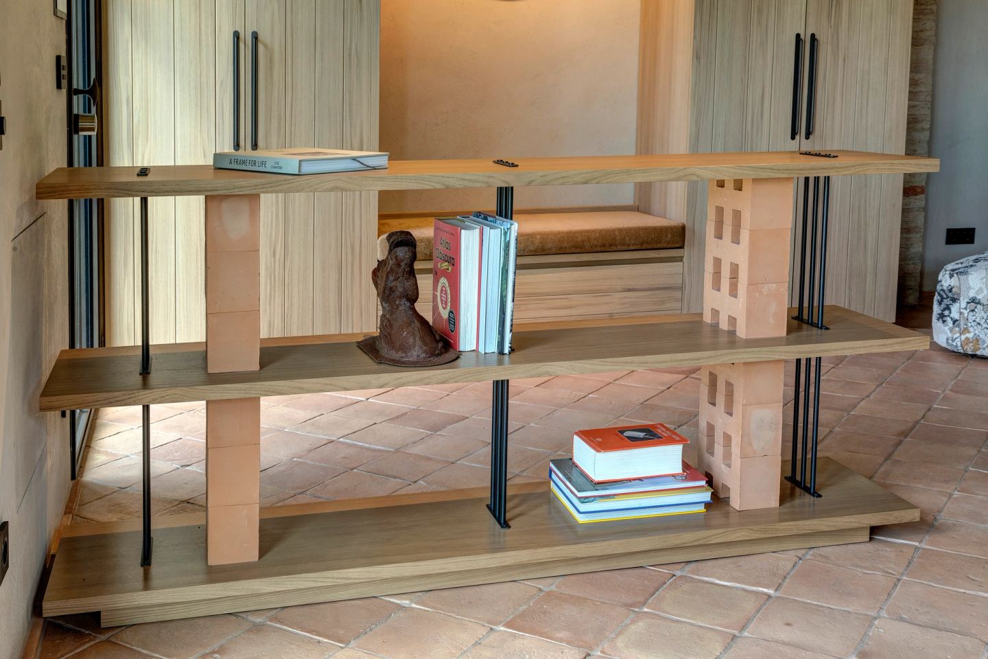 Books and objects along the divider shelves