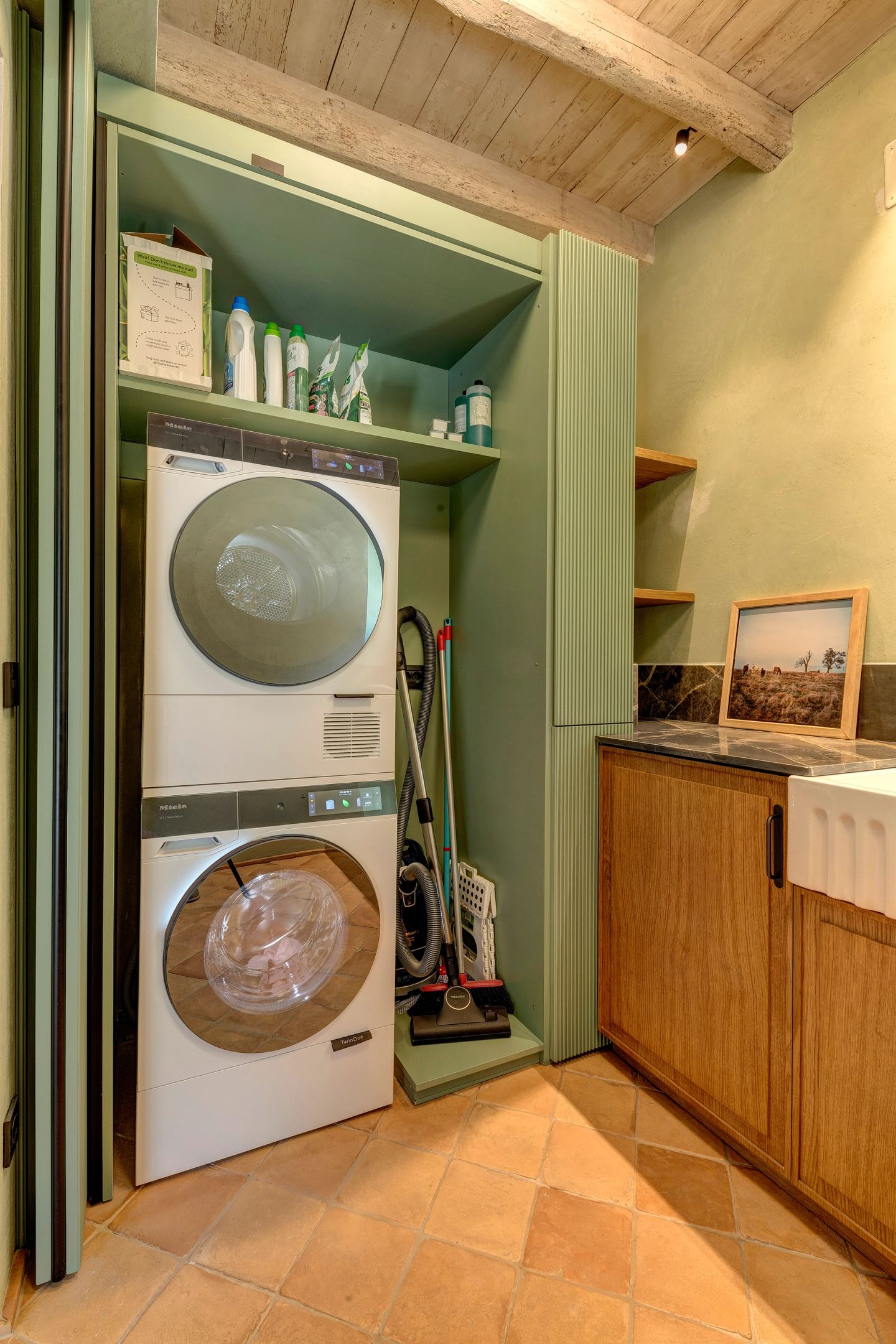 The cupboard open, the counter beyond