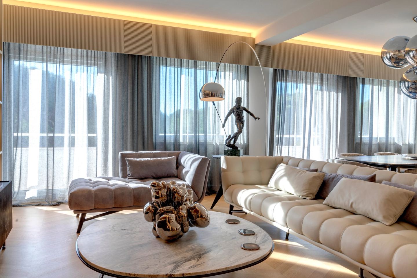Living room with the dining table beyond, one continuous space