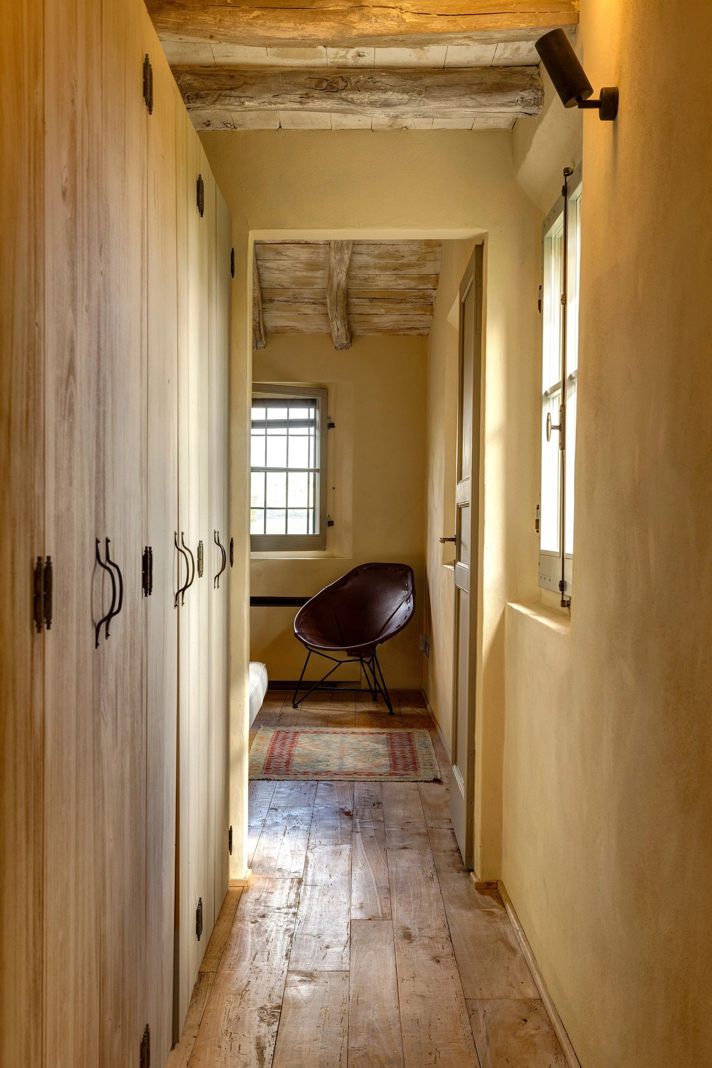 The corridor to the master bedroom, the repainted wardrobes on the left