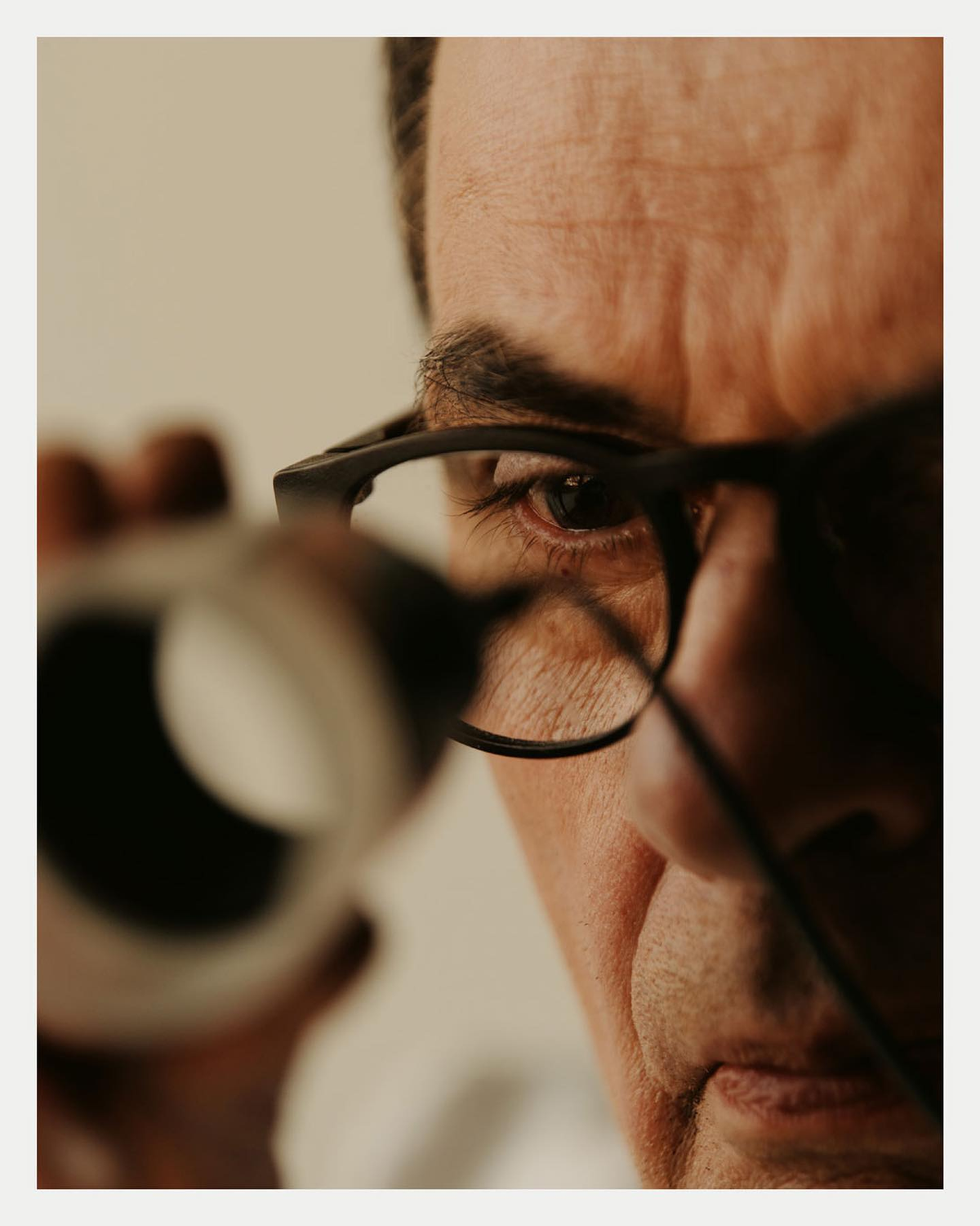 Researcher examining a sample