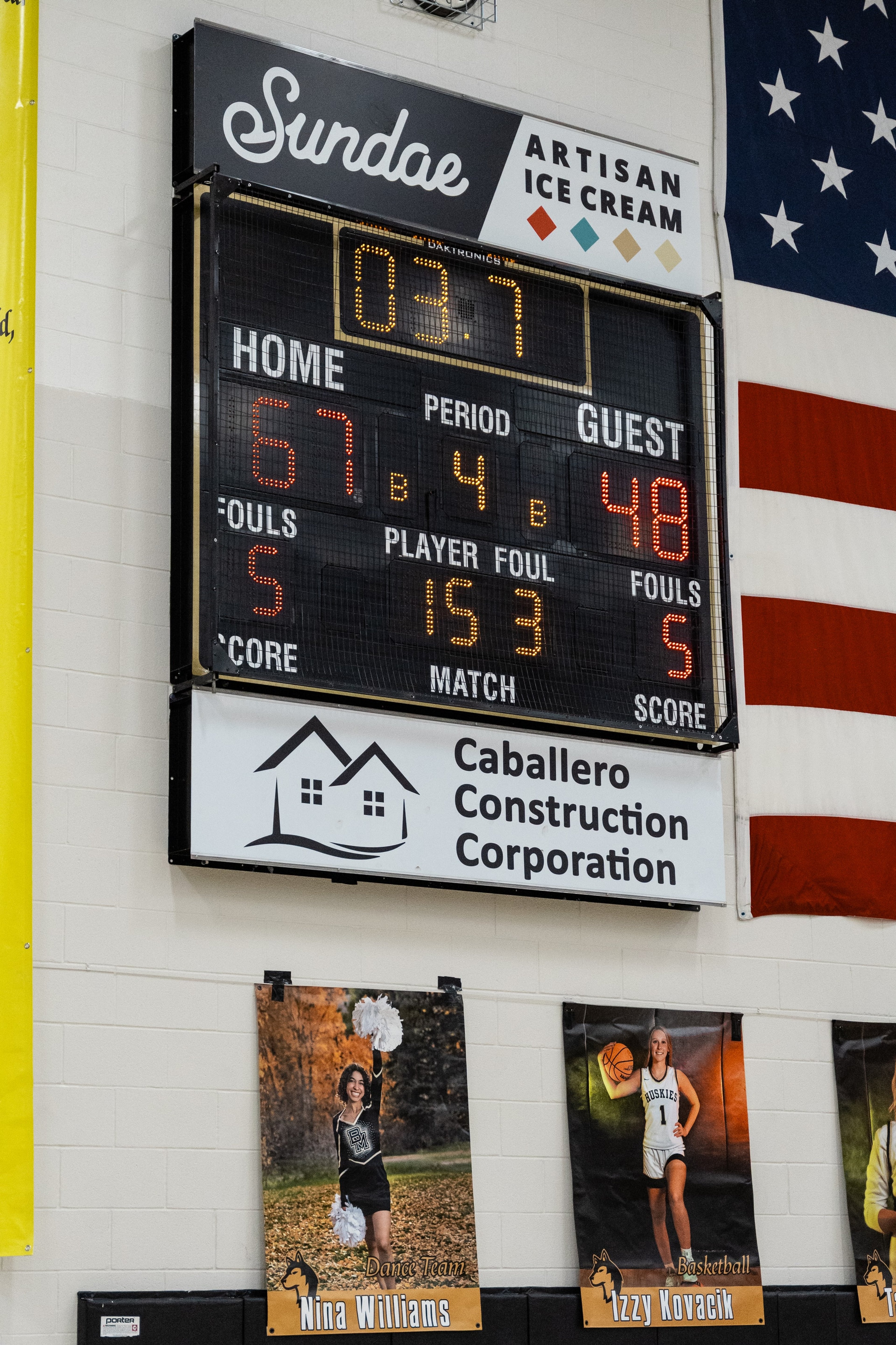 A gym scoreboard late in the fourth quarter