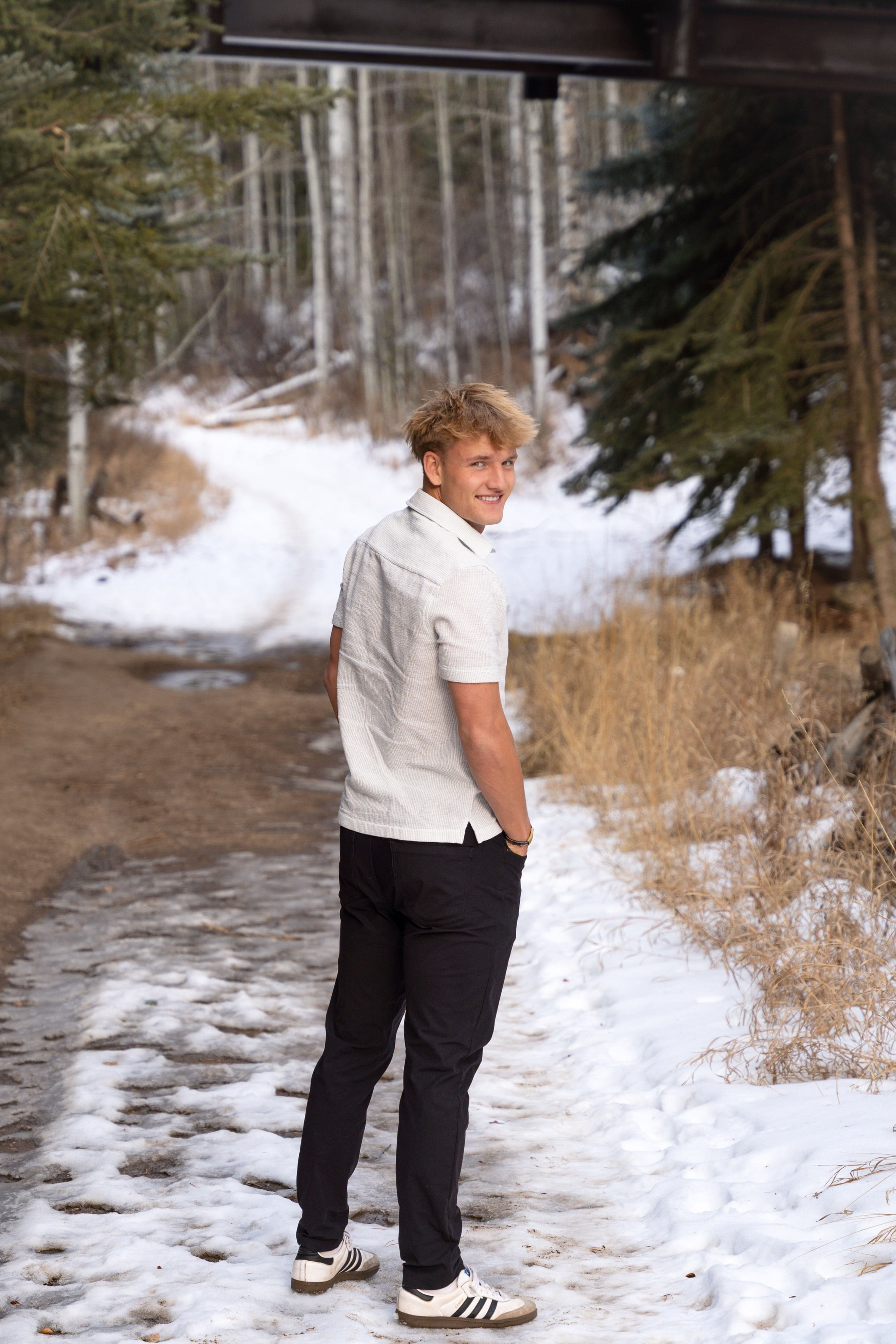 Jakob glancing over his shoulder on a snowy trail