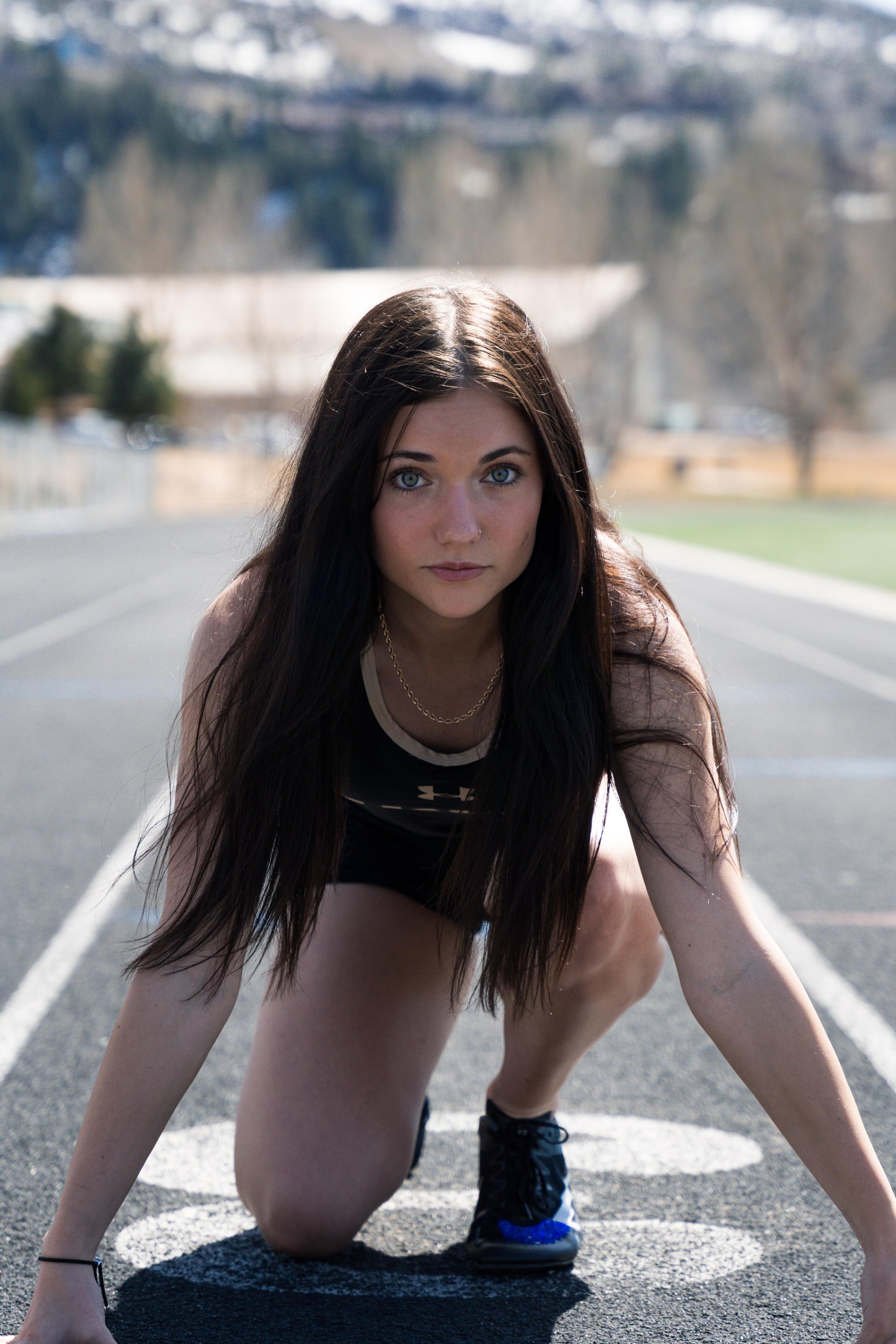 Lucy set in the starting blocks, eyes up the empty lane