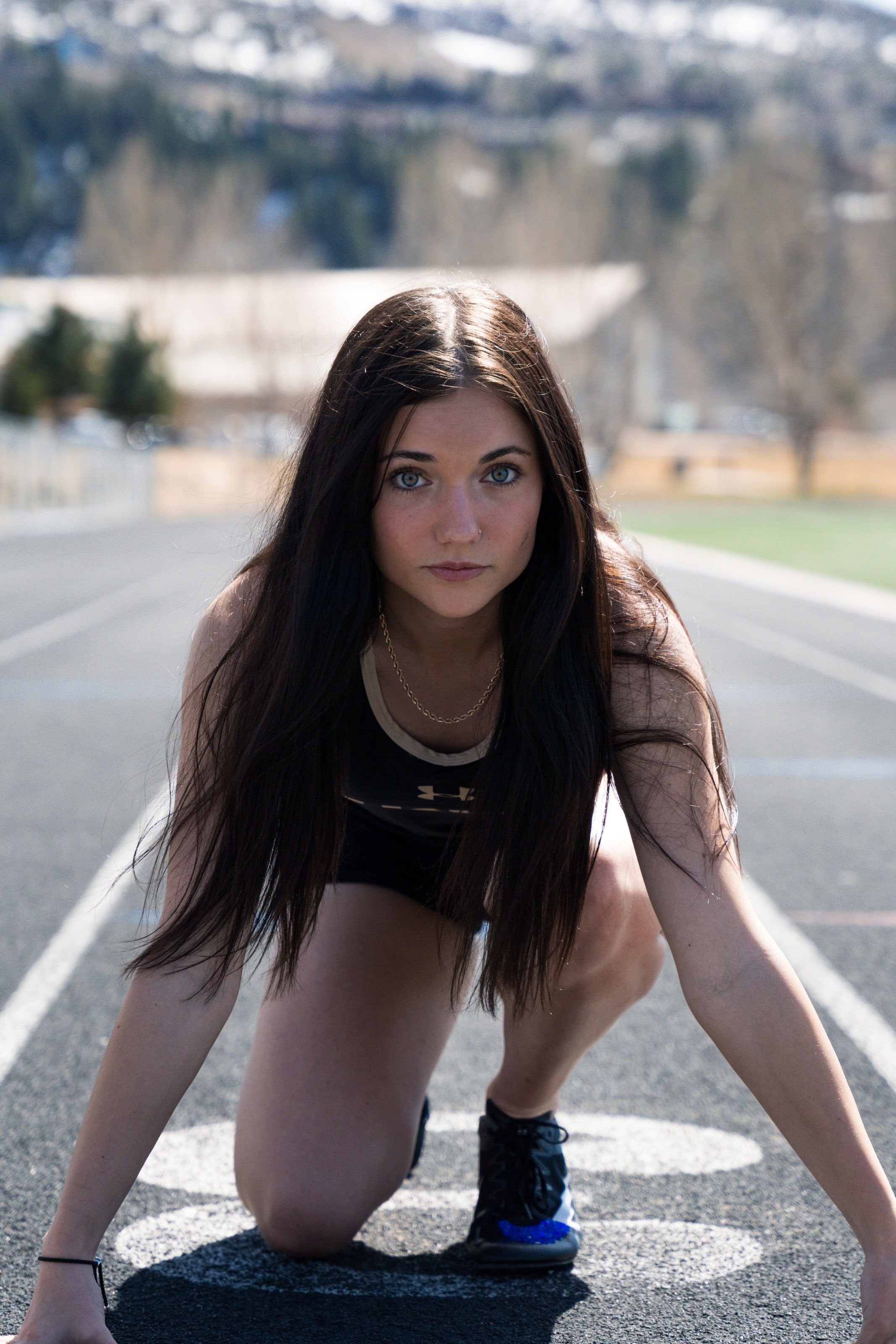 Lucy set in the starting blocks, eyes up the empty lane