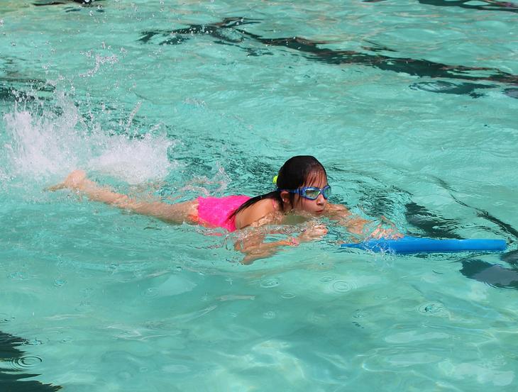 senior girl swimming