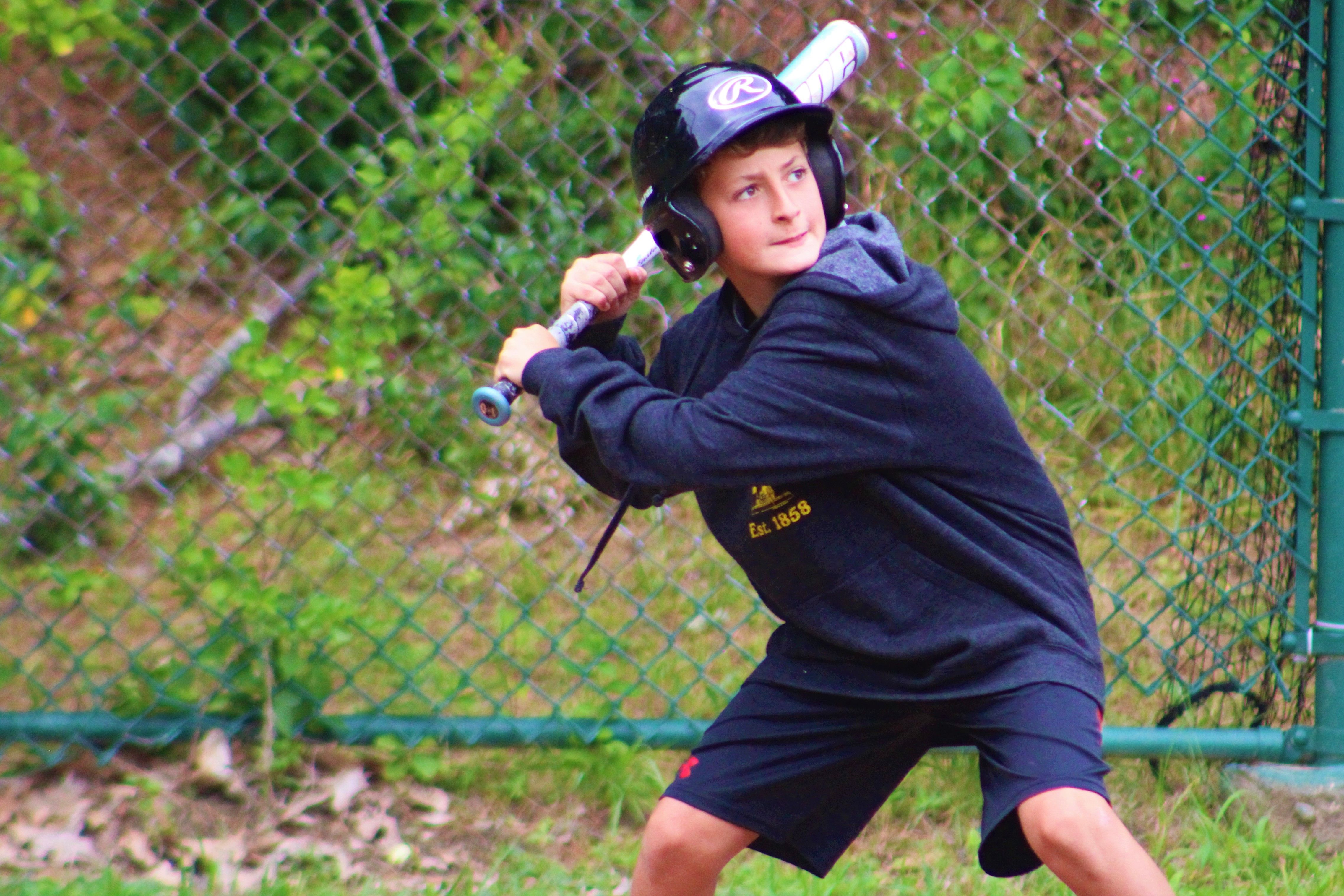 boy playing baseball