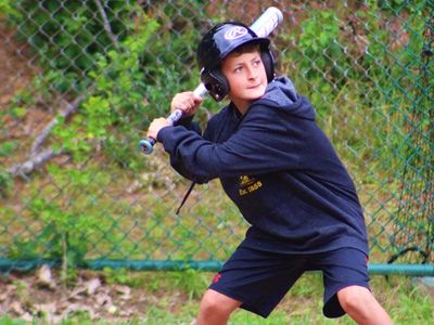 boy playing baseball
