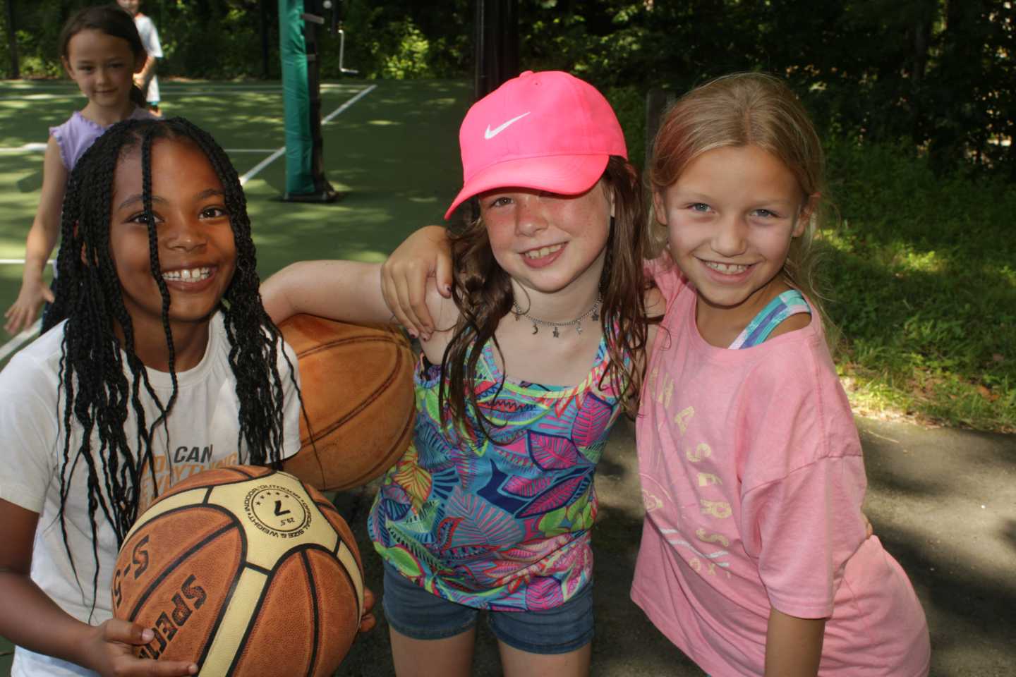 Day Campers playing basketball at Camp Laurelwood