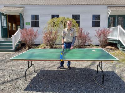 Eagle Scout, Edgar, with the ping-pong table he created for CL!