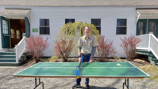 Eagle Scout, Edgar, with the ping-pong table he created for CL!