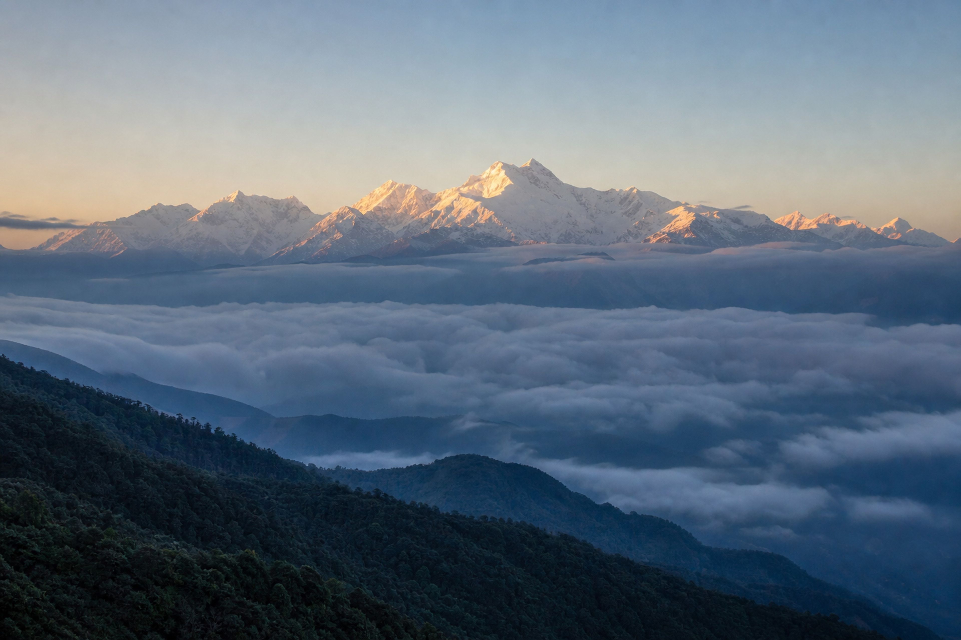 The Khangchendzonga range above a Himalayan cloud layer in Sikkim