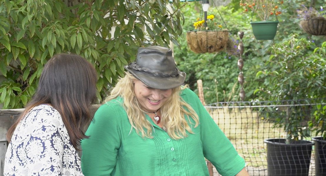 Two women laughing together