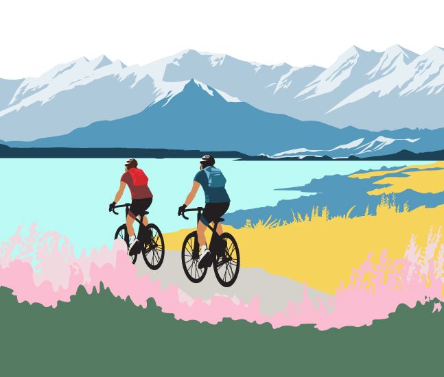 two people cycling in the nature near a lake