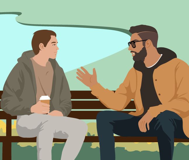 Two men chatting on a bench chair