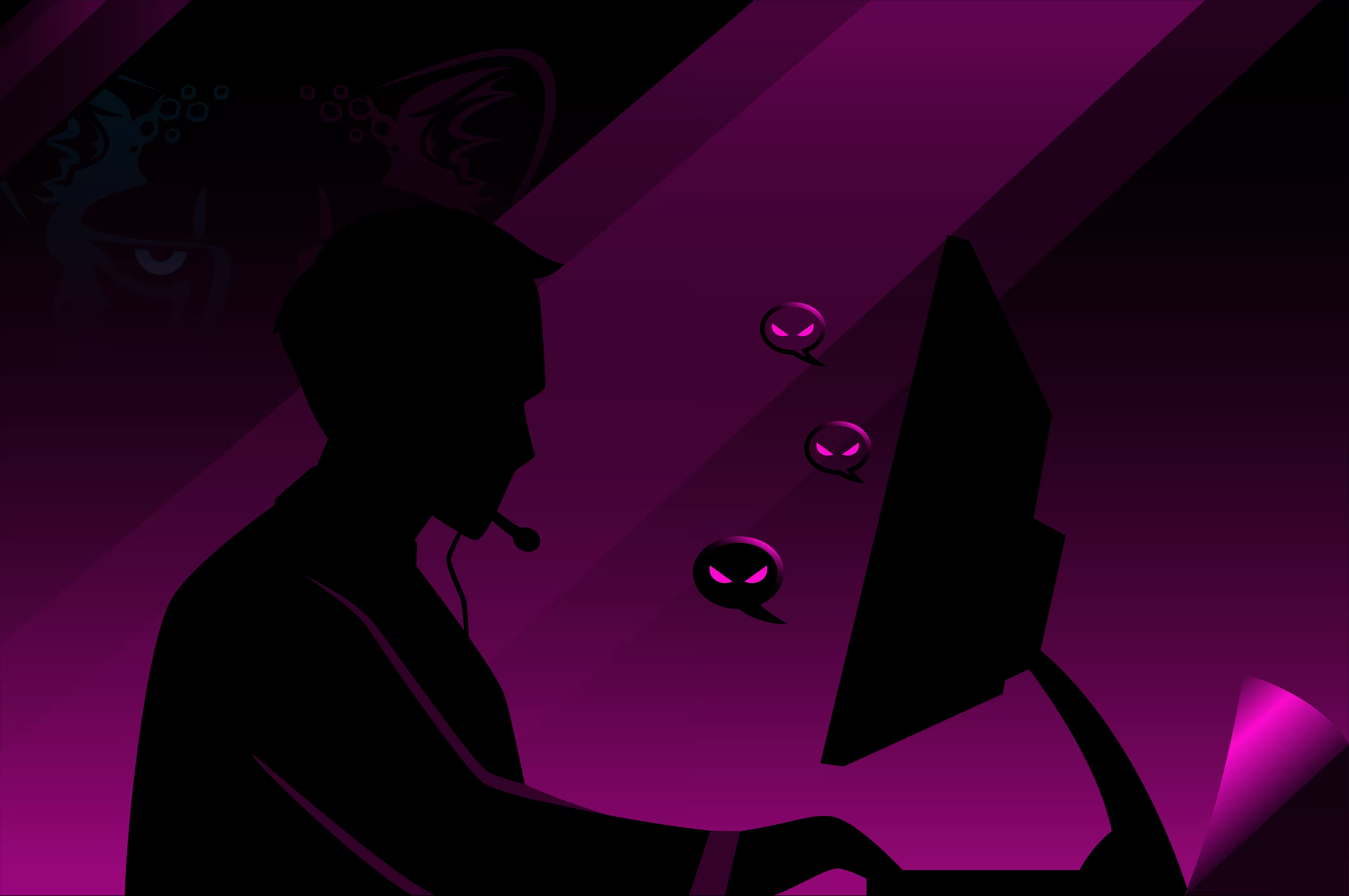 Silhouette of a person working at a computer