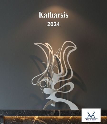 Katharsis, a black painted iron sculpture lit dramatically on a dark stone console