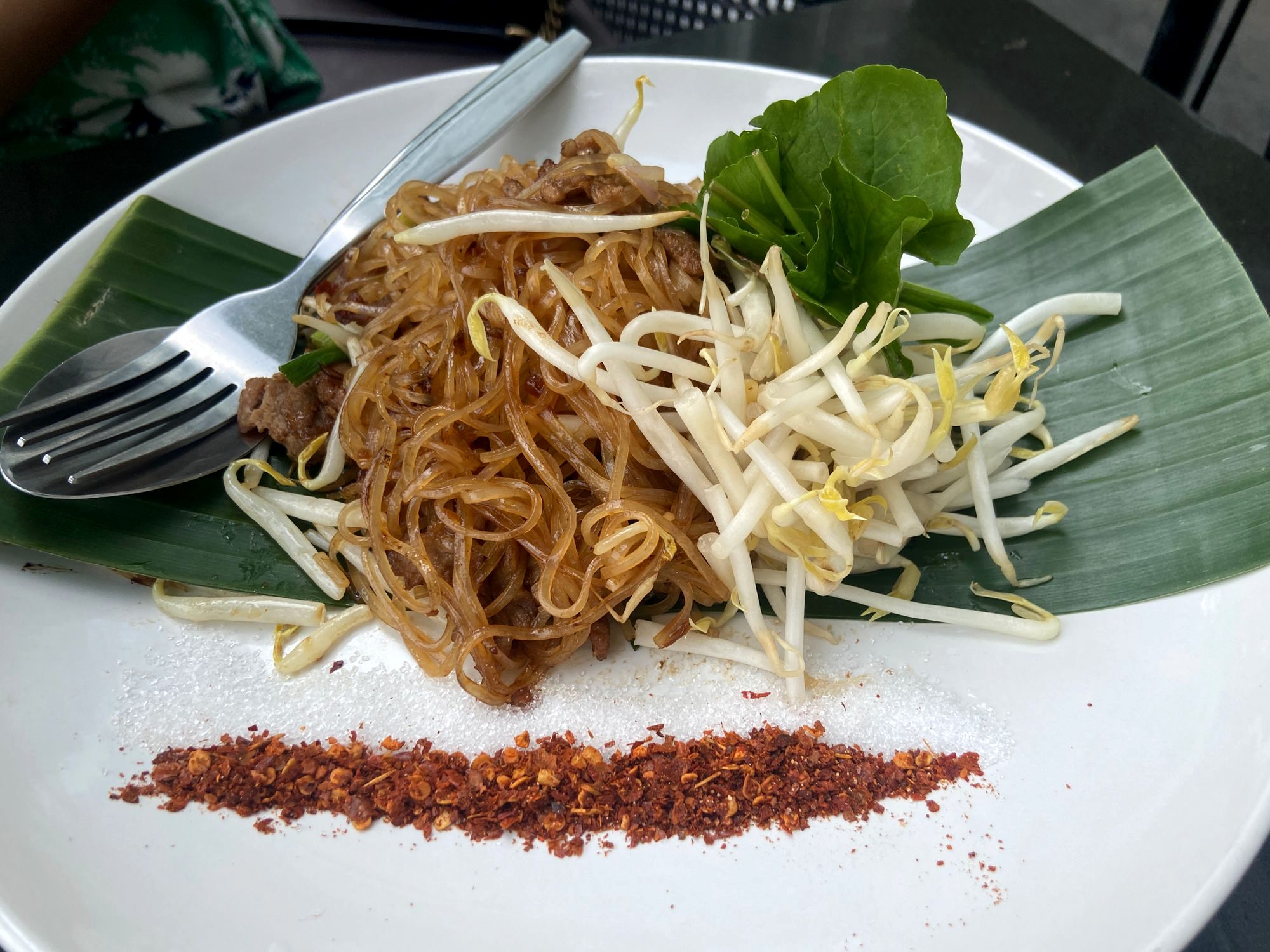 Small bowls of dark-broth boat noodles at a Victory Monument stall in Bangkok