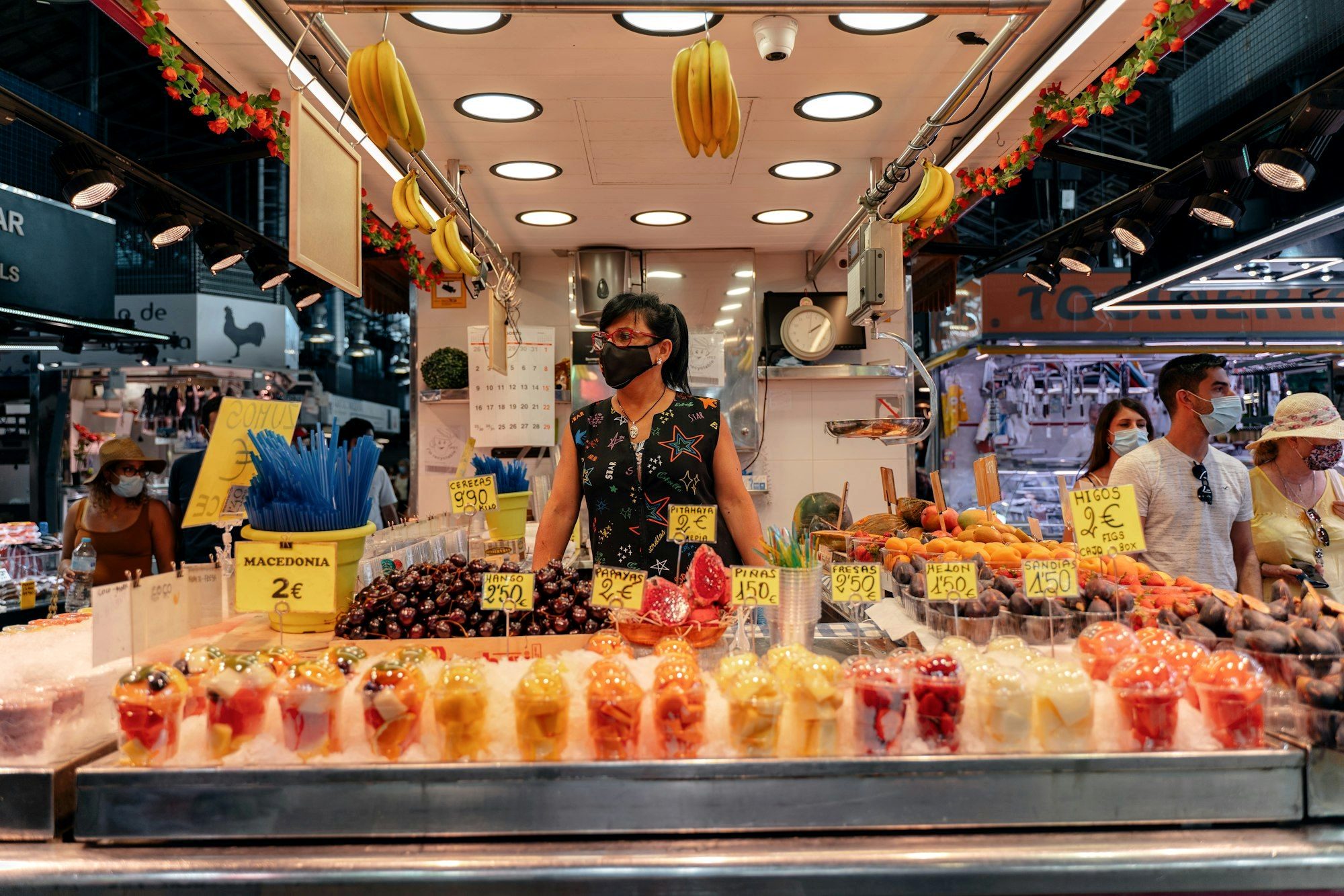 Colorful fruit and produce stalls inside Barcelona's La Boqueria market