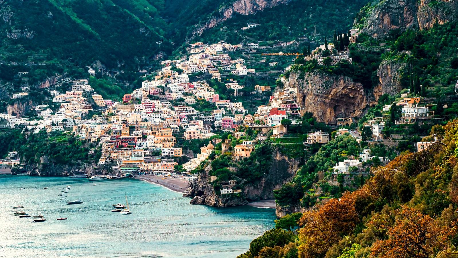 Positano's pastel houses stacked above the sea on the Amalfi Coast