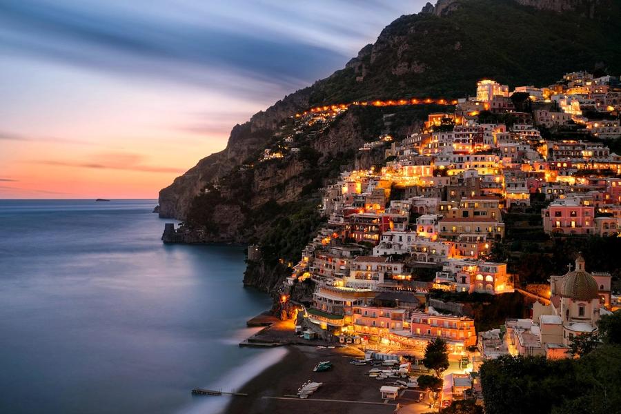 Positano's pastel houses stacked above the sea on the Amalfi Coast