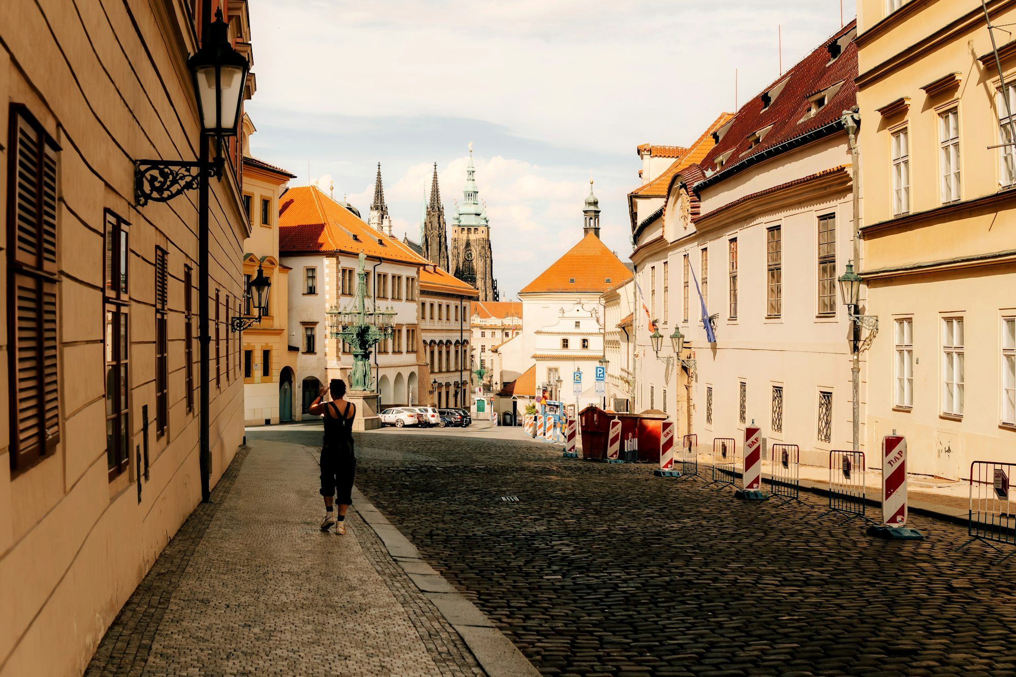 A calm cobblestone square in an underrated European old town at morning