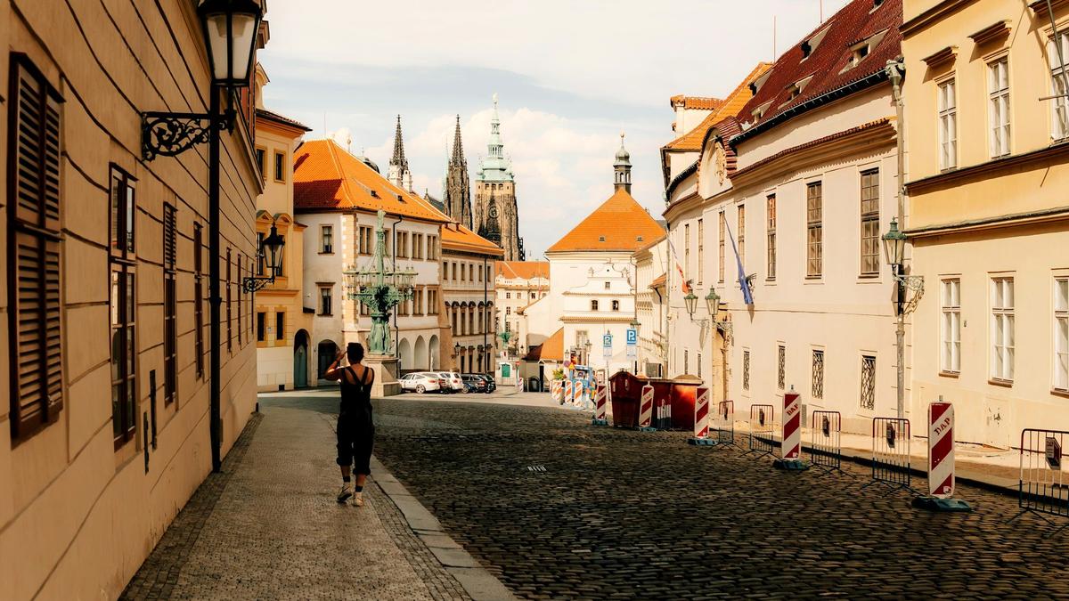 A calm cobblestone square in an underrated European old town at morning