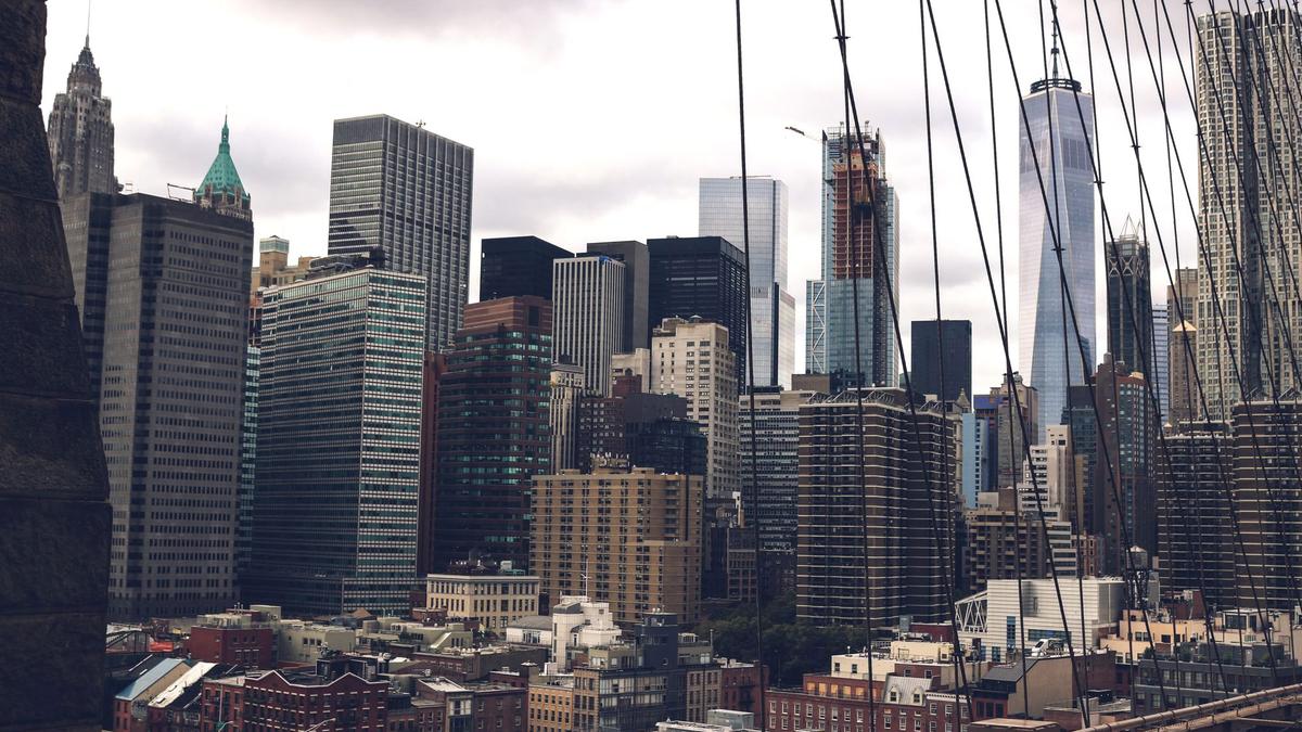 The Brooklyn Bridge and the Manhattan skyline at dusk