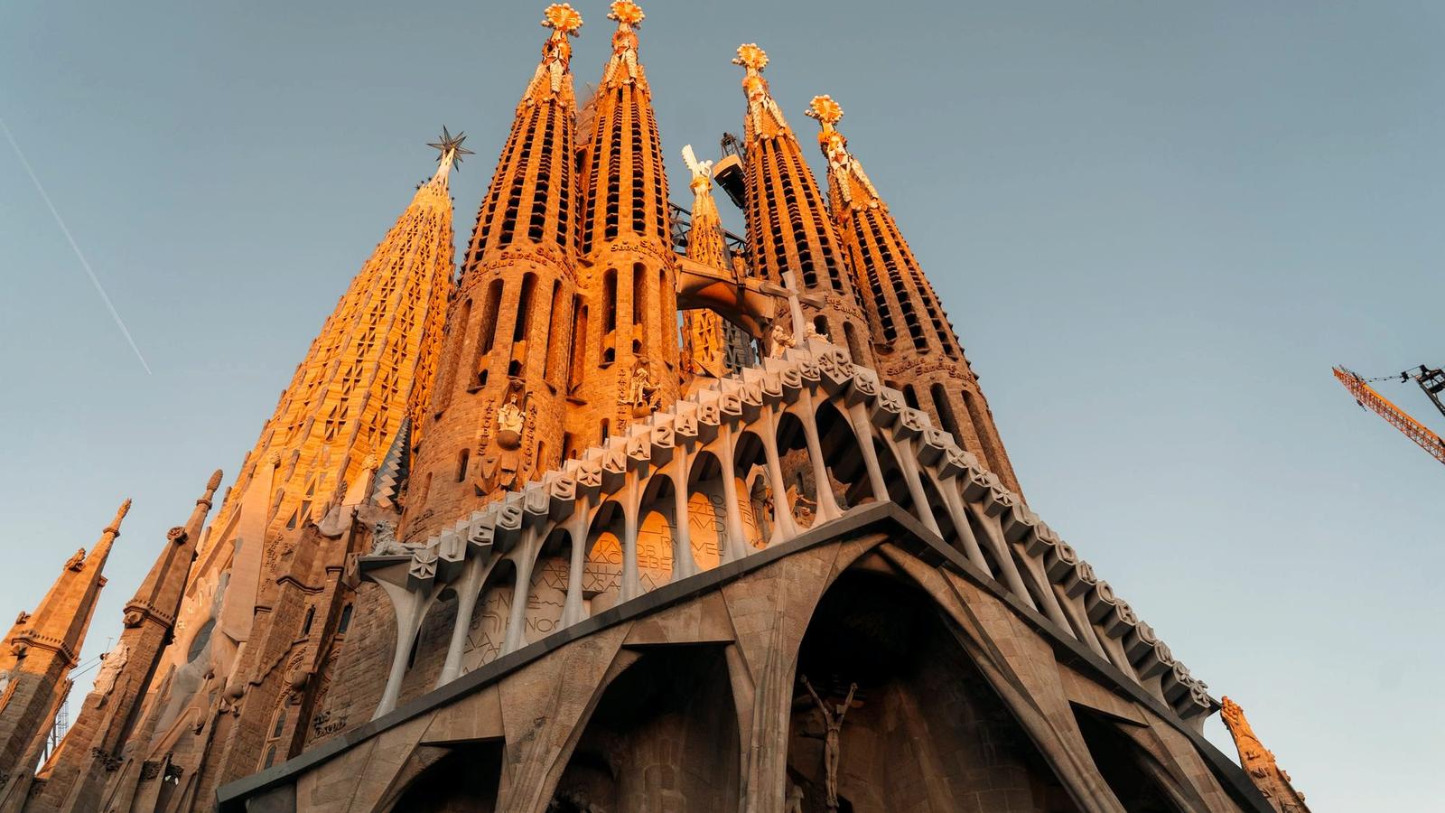 The Sagrada Família basilica towering over Barcelona at golden hour