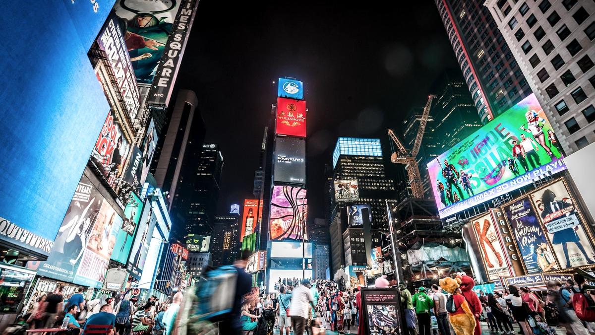 The crowded, billboard-lit chaos of Times Square in New York City at night