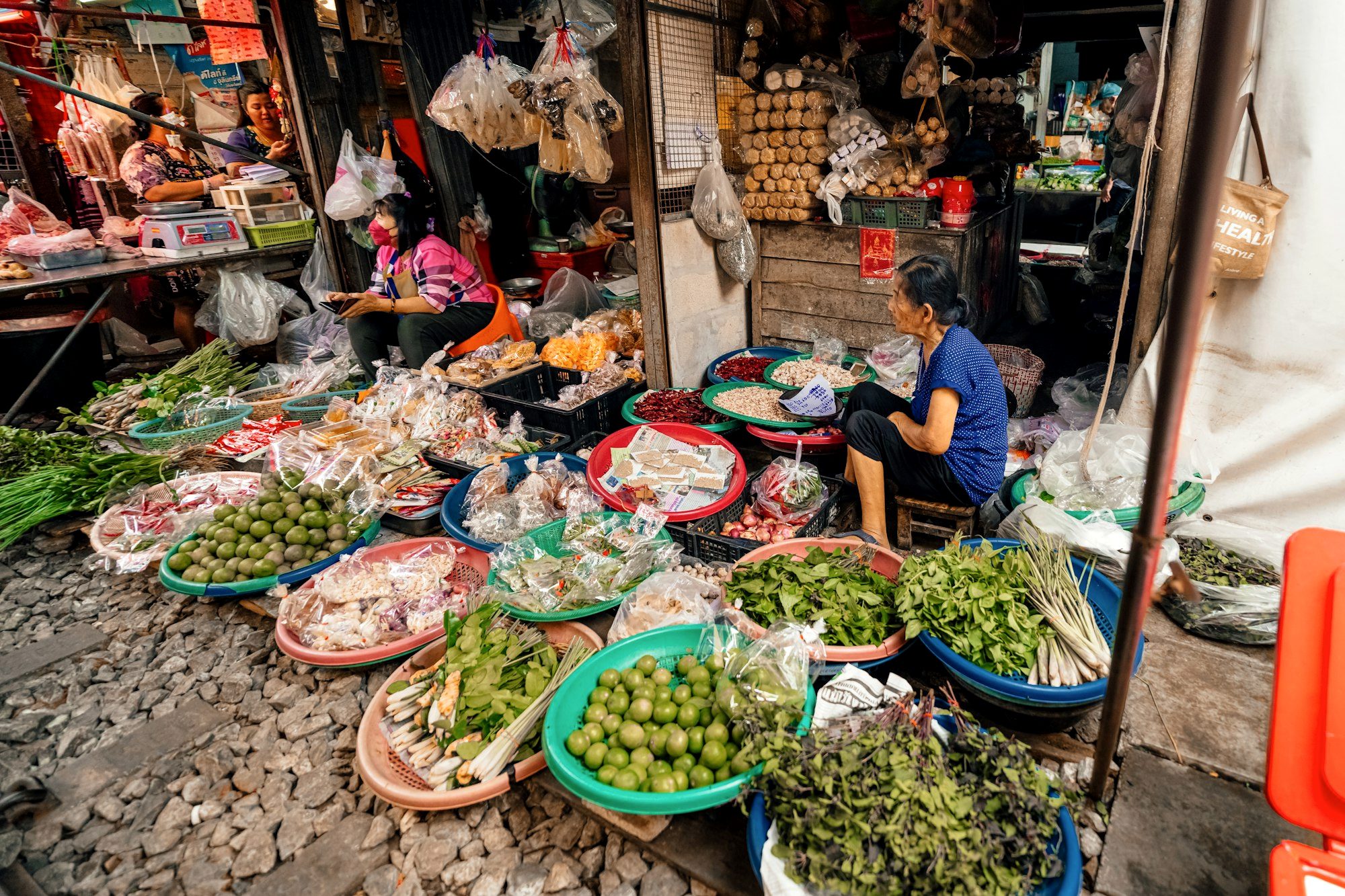 Stalls of dried chiles, quesillo cheese, and produce at Oaxaca's Mercado Benito Juárez