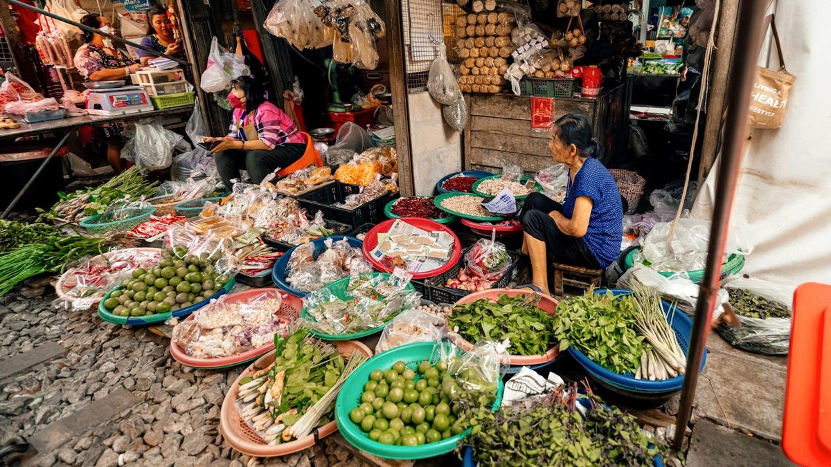 Stalls of dried chiles, quesillo cheese, and produce at Oaxaca's Mercado Benito Juárez