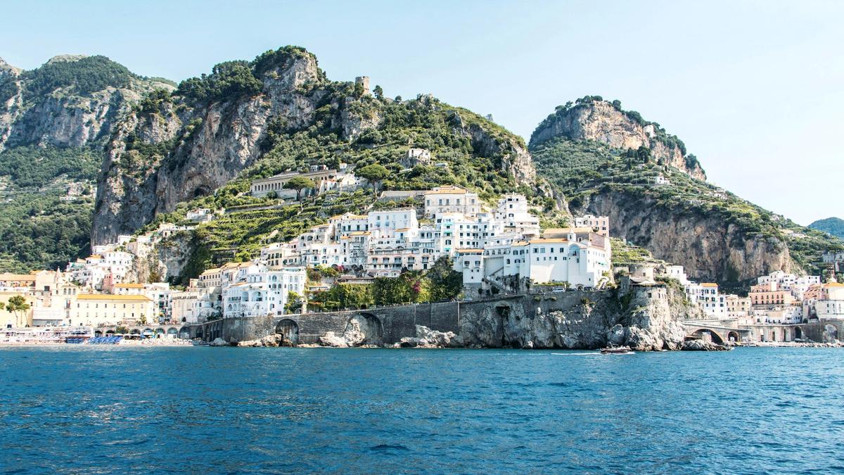 Positano's pastel houses tumbling down the cliffs to the Amalfi Coast shoreline
