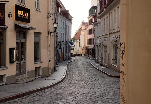 A quiet cobblestone street in an underrated old-town city with no crowds