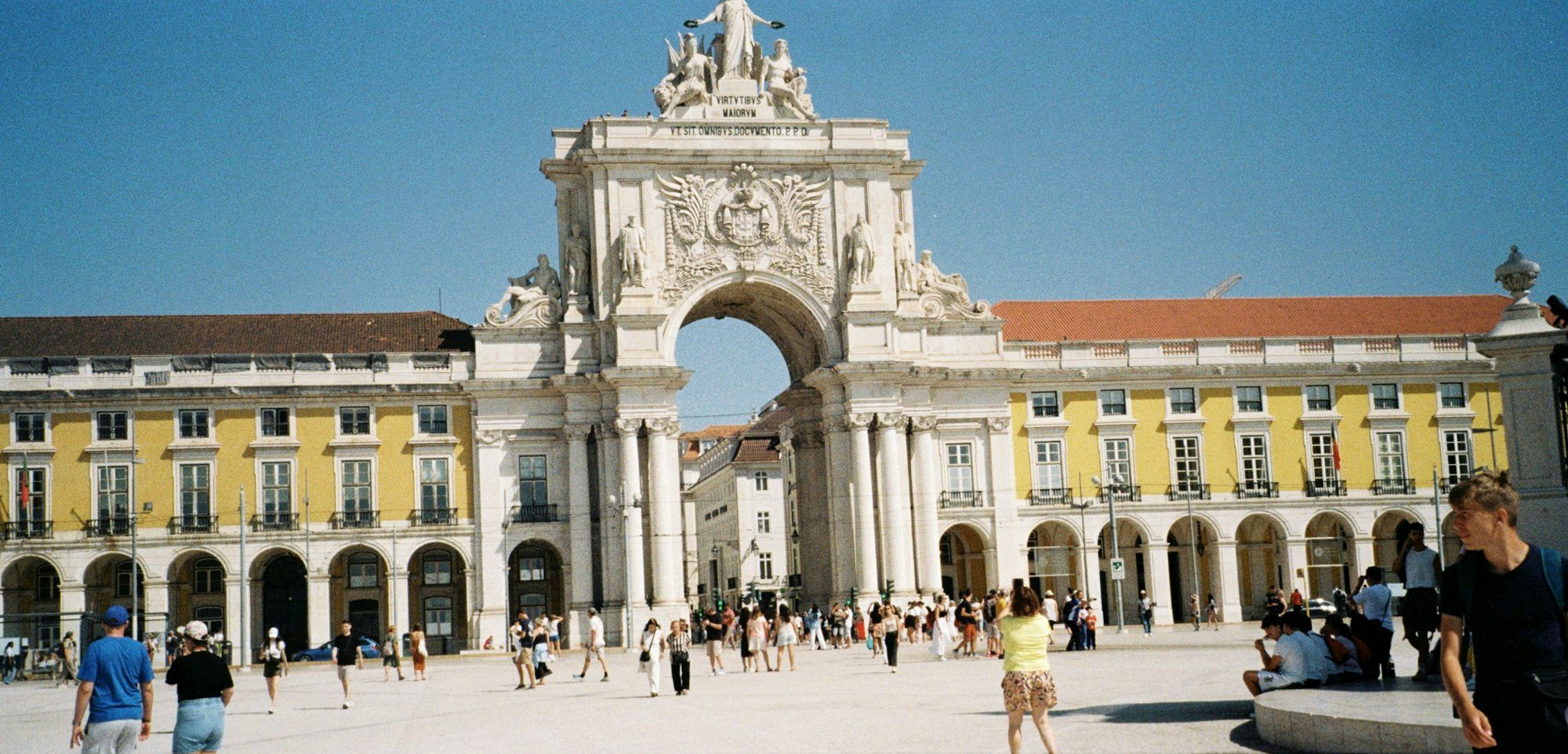 Praça do Comércio, Lisbon's grand riverside square, framed by yellow arcaded buildings