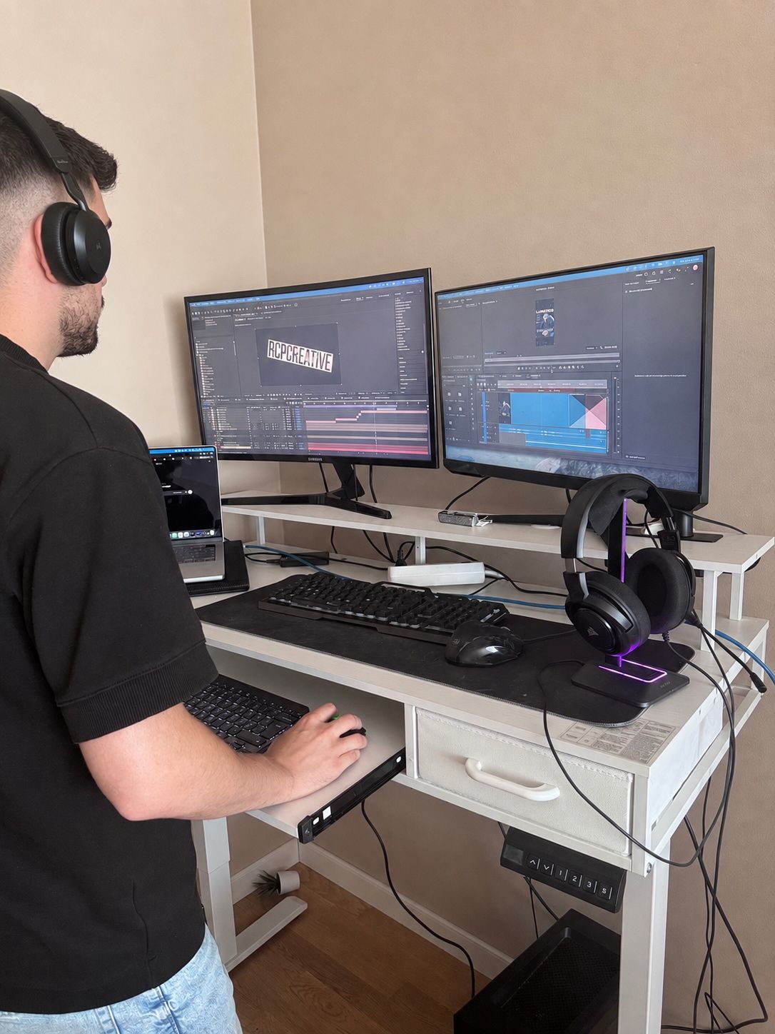 Ruben editing video at his workstation