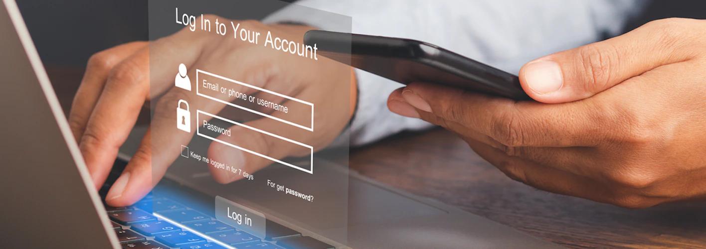 Hands typing on a laptop with a holographic login screen overlay