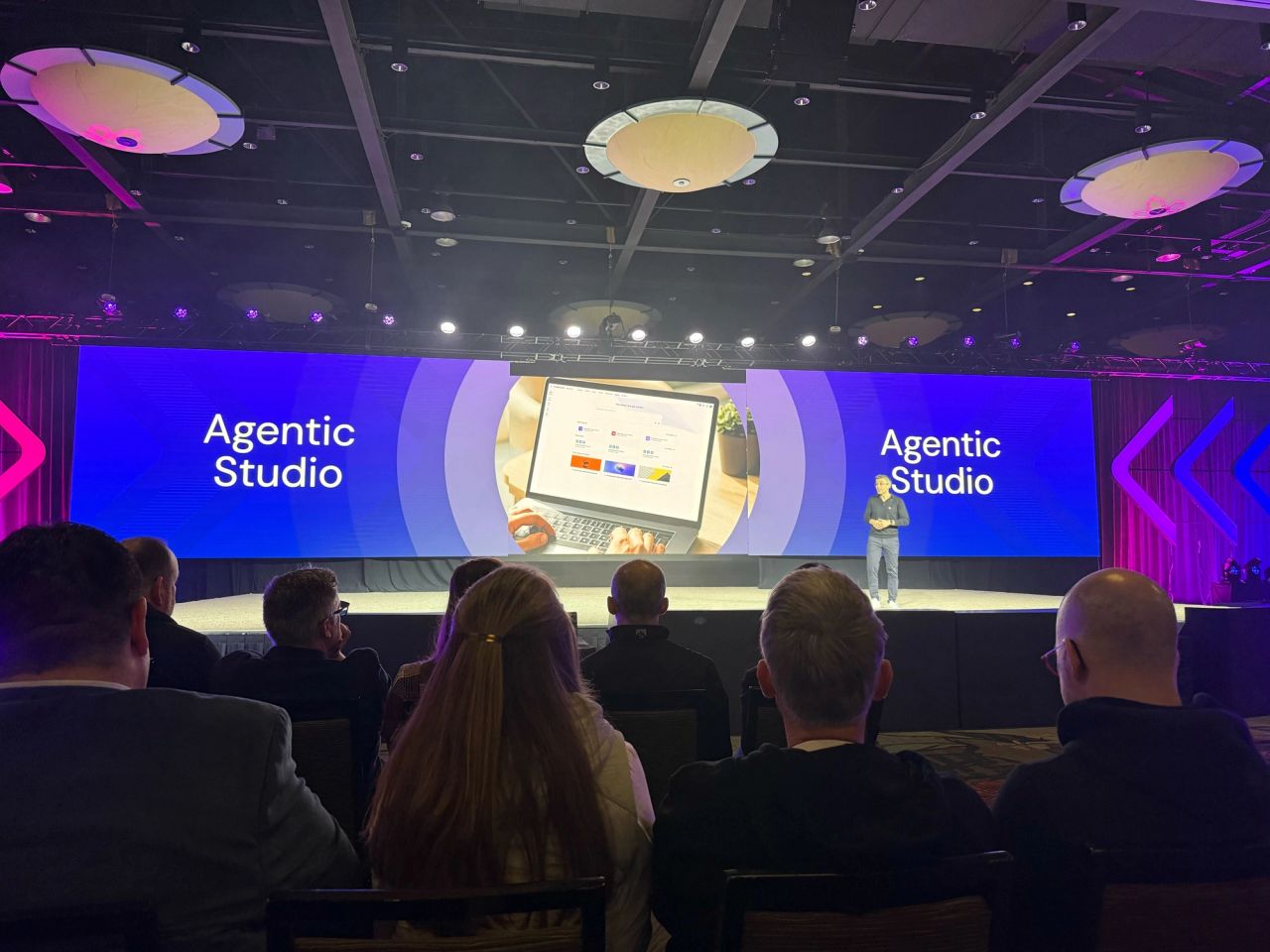 Keynote presentation of Agentic Studio on stage at Sitecore Symposium
