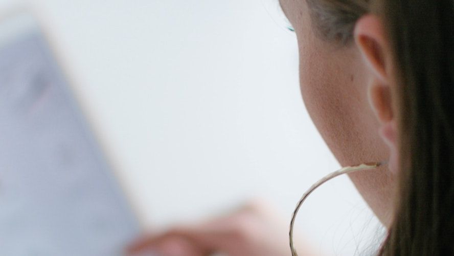 Woman browsing a healthcare website on a tablet