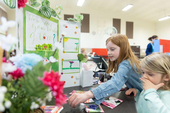 Bernadette Rossing (2) explains how plants grow.